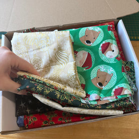 Box Filled With Mixed Christmas Fabric Remnants 1200g
