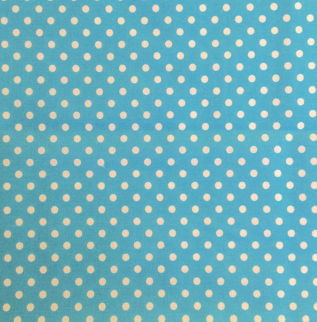 Turquoise polka dot polycotton fabric