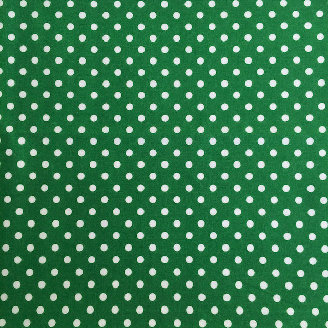 Green polka dot polycotton fabric