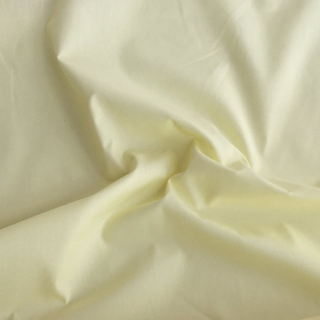 Lemon plain polycotton fabric