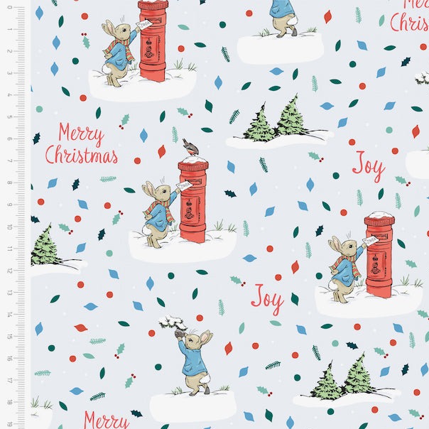 Peter rabbit cotton fabric, pale blue background with postbox & snow