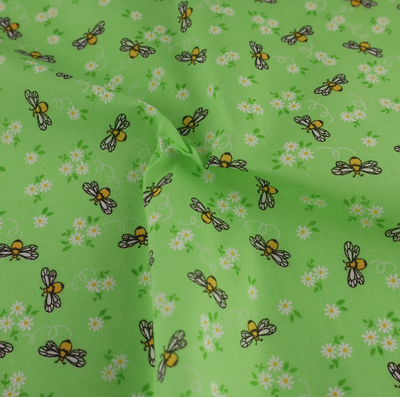 Pretty little bees green polycotton fabric, sold per 1/2 metre 112cm wide