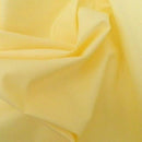 Lemon cotton poplin fabric
