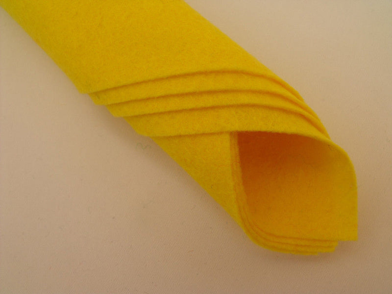 Yellow wool felt square